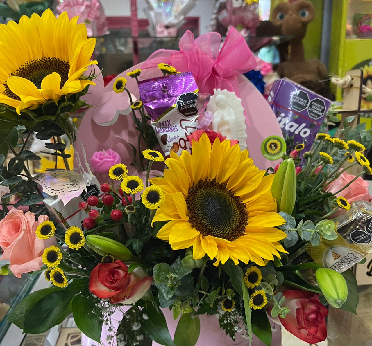 Ancheta con girasoles y dulces